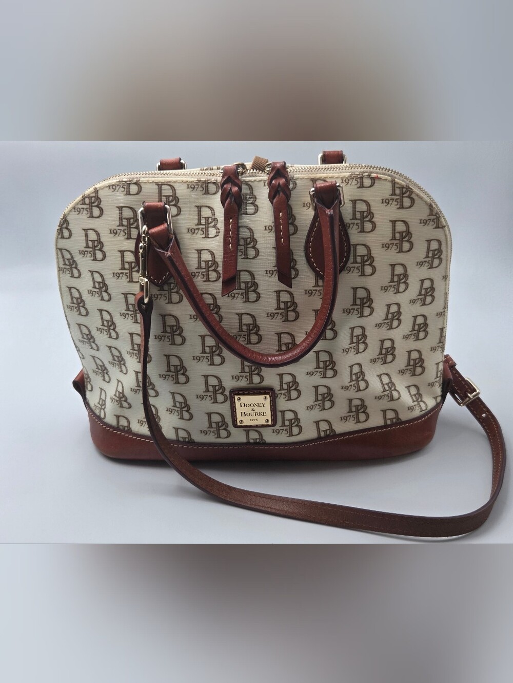 Dooney & Bourke tan and brown monogram signature logo